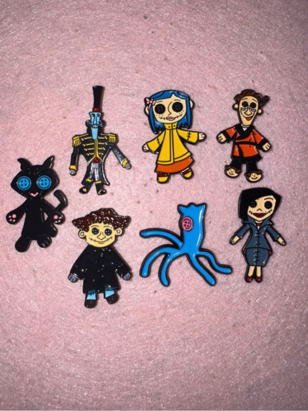 7 piece Coraline enamel pins set